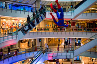 Bangkok. Centralworld mall. Bangkok. Thailand. A hanging Spider-Man figurine displayed at a Bangkok shopping-mall. To celebrate the launch of the movie The amazing Spider-Man 2 in Bangkok, a well-known shopping-mall displays a huge hanging Spider-Man figurine. The mall is Bangkok's largest with hundreds of shops. CentralWorld mega-shopping complex offers one of the most exciting shopping experiences in Bangkok. It has everything from brand name clothing boutiques, funky fashion, high-tech gadgets, bookshops and designer furniture to imported groceries, a lineup of banks, beauty salons, gourmet eateries and even an ice-skating rink. With so many tantalising options to explore, you could easily spend half a day here without realising it.