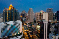 Bangkok. Landcape, views of Sukhumvit Road, sky train,  Westin, Sheraton and skyscrapers from Sofitel Bangkok Sukhumvit. Bangkok. Thailand. Celebrate L art de vivre in one the worlds most vibrant cities and in one of its top hotels Sofitel Bangkok Sukhumvit. Anticipate an exuberant bienvenue or welcome at the heart of this lively and cosmopolitan city. Savour rooftop champagne LOccitane fragranced spa journeys explorations of innovative Asian and European cuisine midnight workouts and afternoon swims amidst a lush landscape nine stories high.