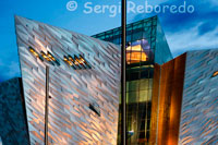 Its creators describe Titanic Belfast® as a "must see" visit in any tour of Belfast and Northern Ireland. Already, tour operators are programming it in to their 2012 schedules.  In November 2011 National Geographic identified Titanic Belfast as the main attraction for visitors to look forward to in 2012, after naming Belfast among the world's top 20 travel destinations for the year, describing it as 'a capital city of Titanic ambition that is redefining itself in the eyes of the world.' It is no accident that the time it will take to construct is a mirror of RMS Titanic’s build. Nor is it coincidental that the shape of architect, Eric Kuhne’s ultra-modern building resembles the hulls of four ships. The height and position of the building are also a nod to slipway number 2 where Titanic was constructed and the towering presence it exerted over Queen’s Island. 