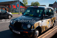 Belfast Black Taxi tours. You have reached the World Famous Black Taxi Tours of Belfast. Being the Official Black Taxi Tours gives you the confidence that your tour of our city will be fun, friendly, educational, value-for-money and unpredictable!  Our local guides will tailor your tour, giving you the option of where you would like to visit most and of course will supply commentary featuring local stories and wit.  Start your tour in the City Centre, then move through the Shipyards and see where HMS Titanic was built and launched from. See the political districts which have bore the brunt of conflict over the last thirty years before seeing the elegant University Quarter and Museum district.  Finish your trip with a big bowl of Irish Stew and the ubiquitous pint of Guinness to wash it all down.  We are also happy to arrange tours to the North Antrim Coast were you can explore the Giants Causeway, Dunluce Castle, the Carrick-a-rede Rope Bridge and Bushmills Distillery. Just contact us for further details. 
