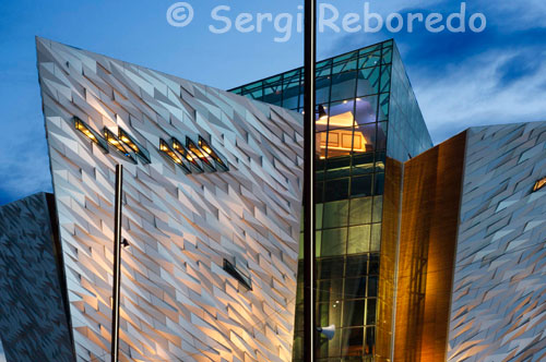 Its creators describe Titanic Belfast® as a "must see" visit in any tour of Belfast and Northern Ireland. Already, tour operators are programming it in to their 2012 schedules.  In November 2011 National Geographic identified Titanic Belfast as the main attraction for visitors to look forward to in 2012, after naming Belfast among the world's top 20 travel destinations for the year, describing it as 'a capital city of Titanic ambition that is redefining itself in the eyes of the world.' It is no accident that the time it will take to construct is a mirror of RMS Titanic’s build. Nor is it coincidental that the shape of architect, Eric Kuhne’s ultra-modern building resembles the hulls of four ships. The height and position of the building are also a nod to slipway number 2 where Titanic was constructed and the towering presence it exerted over Queen’s Island. 