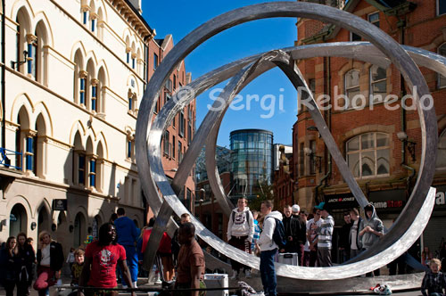 The Spirit of Belfast is a public art sculpture by Dan George in Belfast, Northern Ireland. The sculture was unveiled on 25 September 2009 after a series of delays and is located on Arthur Square, close to the main point of access to Victoria Square. The sculpture is constructed of steel and cost £200,000. As with other public works of art in Northern Ireland the sculpture has been given a nickname, the "Onion Rings". The coloured lighting is designed to reflect the texture and lightness of linen, while the metal reflects the strength and beauty of shipbuilding, two important aspects of Belfast's history. Spirit of Belfast is part of a £16m Belfast: Streets Ahead streetscape improvement project which aims to improve the city centre.[6] Spirit of Belfast completes the refurbishment of Arthur Square. The sculpture was scheduled to be in place by June 2008. However after several delays it was not put in place until September 2009. 