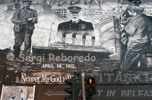 Titanic Wall Mural, Dee Street, Belfast This wall mural is on the corner of Netwownards Road and Dee Street. Dee Street led into the Harland and Wolff shipyard where RMS Titanic (and many other ships) were built - many of the shipyard workers who lived in this area would have walked up and down Dee Street on their way to and from work. The writing bottom right reads; 'This mural is respectfully dedicated to the men, women and children who lost their lives in the waters of the North Atlantic on the night of April 14th 1912: to those who survived - whose lives from that night on were forever altered and to those who built the Titanic "we forget them not" ' The writing botton laft (below the White Star flag) writes; RMS Titanic Her name is publicly announced April 1908. Designation begins on March 1909 On May 31st 1911, the Titanic was launched here in Belfast April 10th 1912 She left Southampton for New York April 14th 1912 Disaster struck in the North Atlantic ocean, 1523 people lost their lives in the disaster, 705 passengers and crew survived.' 