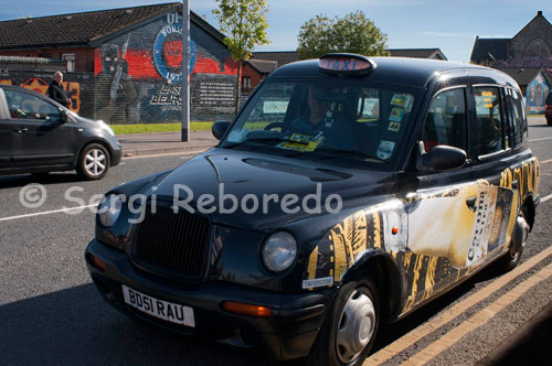 Belfast Black Taxi tours. You have reached the World Famous Black Taxi Tours of Belfast. Being the Official Black Taxi Tours gives you the confidence that your tour of our city will be fun, friendly, educational, value-for-money and unpredictable!  Our local guides will tailor your tour, giving you the option of where you would like to visit most and of course will supply commentary featuring local stories and wit.  Start your tour in the City Centre, then move through the Shipyards and see where HMS Titanic was built and launched from. See the political districts which have bore the brunt of conflict over the last thirty years before seeing the elegant University Quarter and Museum district.  Finish your trip with a big bowl of Irish Stew and the ubiquitous pint of Guinness to wash it all down.  We are also happy to arrange tours to the North Antrim Coast were you can explore the Giants Causeway, Dunluce Castle, the Carrick-a-rede Rope Bridge and Bushmills Distillery. Just contact us for further details.