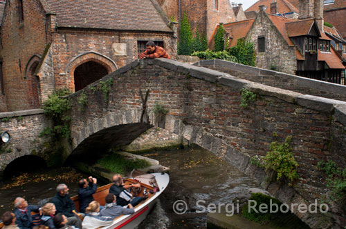 Sergi Reboredo. Bruges st bonifacius brigde. The St. Bonifacius Bridge is one of the many stone bridges over the canals on Brugge, Belgium. This bridge is close to the Gruuthuse and the Arentshof and although it is sometimes said to be the oldest bridge in Brugge that is not the case and was only built in around 1910. Around the bridge old medieval style houses can be seen adding to the atmosphere.
