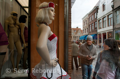 Sexy nurse in a erotic shop in Wollestraat Street. Bruges. 