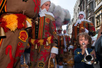 The Belgian festival Binche with their traditional costumes: Eastern princes, sailors and harlequins through the streets of Brussels. An amazing procession through the cobbled streets of the city to the beat of drums and artists with their wax masks and ostrich feathers. Quite an experience.