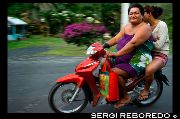 Rarotonga Island. Cook Island. Polynesia. South Pacific Ocean. Two obese people drive a motorcycle on a road on the island of Rarotonga.  Obesity in the Pacific is a growing health concern with health officials stating that it is one of the leading causes of preventable deaths in the Pacific Rim. According to Forbes, Pacific island nations and associated states make up the top seven on a 2007 list of fattest countries, and eight of the top ten. In all these cases, more than 70% of citizens age 15 and over have an unhealthy weight. Reasons for this issue include mining operations that have left not much arable land; as a result, much of the local diet is of processed, imported food such as Spam or corned beef, rather than fresh fish, fruit and vegetables. In addition, cultural factors have been blamed, such as associating a large body size with wealth and power, or changing ways of living, with children leading more sedentary lives. The problem is leading to increased levels of illness, including diabetes and heart diseases. In the Marshall Islands in 2008 there were 8,000 cases of diabetes in a population of only 53,000. In Fiji, strokes used to be rare in the under 50s, whilst doctors reported that they had become common amongst patients in their 20s and 30s. The problems are not confined to the small island nations, with the United States appearing 9th on the list, New Zealand 17th, and Australia 21st. In Australia, ambulances have been redesigned and equipped with heavier stretchers and larger wheelchairs to take account of the increased weight of the patients they carry.