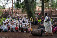 Several separated children do catechesis within the precincts of the church of St Mary of Zion in Axum. the Ark of the Covenant is a relic venerated by the Ethiopians earnestly why churches keep in their most sacred enclosure a replica of the Ark of the Covenant containing the Tabot. The Tabot that is saved in the Ethiopian church is a replica (wood or stone) of the Tables of the Law would be retained in the original St. Mary of Zion in Axum. We are in Axum, before the facade of the Church of Our Lady of Sion, place where tradition says and as is currently the Ark of the Covenant. Inside the temple a single person, a priest, a chosen one, a direct descendant of the Levites, jealously guards the treasure and not allow anyone to touch or see.