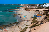 Formentera. Migjorn beach, Formentera, Balears Islands, Spain. Hotel Riu la Mola. Holiday makers, tourists, Platja de Migjorn, beach, Formentera, Pityuses, Balearic Islands, Spain, Europe.