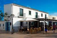 Formentera. Tourists, Bars and restaurants in main square of Sant Francesc Xavier, San Francisco Javier, Formentera, Pityuses, Balearic Islands, Spain, Europe.  