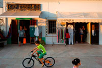 Formentera. Tourists, Shops in main square of Sant Francesc Xavier, San Francisco Javier, Formentera, Pityuses, Balearic Islands, Spain, Europe.  