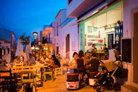 Formentera. Tourists, Big Store,  Bar and restaurant in Isidor Macabich street of Sant Francesc Xavier, San Francisco Javier, Formentera, Pityuses, Balearic Islands, Spain, Europe.  Next to the Constitution square.