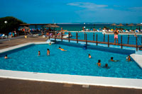 Formentera. Swimming pool of Insotel Club Maryland, Migjorn beach, Formentera, Balears Islands, Spain. Holiday makers, tourists, Platja de Migjorn, simming pool, Formentera, Pityuses, Balearic Islands, Spain, Europe.