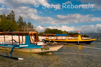 Some boats for diving lie in the sand on the beach in the west of the island, near the pier Bounty Resort. Gili Meno.