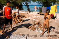 Children have fun area to fishing by a simple rope and a hook. Gili Meno.