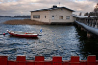 Helsinki. Boats by the sea outside the small cafe Regatta, one of the most visited cafes in town. Why locals love? Love, love, love this little cute little wooden building right next to the water in Meilahti. Why you should visit The smell of cinnamon buns best of Helsinki (korvapuusti) if you are swirling around inside cozy between Finnish paraphernalia old. If not go outside to enjoy the sun and the breeze on the waterfront terrace expanding. You can even grill your food there. Simply divine.
