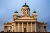The Helsinki Cathedral was designed by the architect's favorite Russian tsar, Carl Ludvig Engel, as part of the reconstruction of Helsinki in the 19th century after a fire caused by being forcibly annexed by the Russians and destroyed much city??. The building was begun in 1830 and completed after Engel's death in 1852. The design of the cathedral is in the form of a Greek cross, much like a Russian Orthodox Church, although it is a Lutheran church. 93% of the Finnish population is Lutheran. The four small domes that may be now added to the original design after the death of Engel. The head of it was Ernst Lohrmann, who also added zinc statues of the twelve apostles on the roof and two side buildings, one of which is a bell tower, and the other is a chapel.