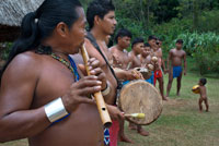 Music and dancing in the village of the Native Indian Embera Tribe, Embera Village, Panama. Panama Embera people Indian Village Indigenous Indio indios natives Native americans locals local Parque National Chagres. Embera Drua. Embera Drua is located on the Upper Chagres River. A dam built on the river in 1924 produced Lake Alajuela, the main water supply to the Panama Canal. The village is four miles upriver from the lake, and encircled by a 129.000 hectare National Park of primary tropical rainforest.