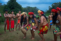 Music and dancing in the village of the Native Indian Embera Tribe, Embera Village, Panama. Panama Embera people Indian Village Indigenous Indio indios natives Native americans locals local Parque National Chagres. Embera Drua. Embera Drua is located on the Upper Chagres River. A dam built on the river in 1924 produced Lake Alajuela, the main water supply to the Panama Canal. The village is four miles upriver from the lake, and encircled by a 129.000 hectare National Park of primary tropical rainforest. Lake Alajuela can be accessed by bus and mini-van from the city of Panama. It lies an hour from the city, close to the town of Las Cumbres. From a spot called Puerto El Corotu