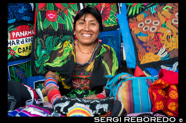 Kuna women sell their molas to the tourists. Panama City Casco Viejo kuna indian traditional handicraft items sellers by kuna tribe.  Old Quarter, Panama City, Republic of Panama, Central America. In Balboa, on Avenida Arnulfo Arias Madrid and Amador, is a small YMCA Handicrafts Market, with mostly Kuna and Emberá indigenous arts and crafts, and clothing. Old Artesanal YMCA Go for: native handicrafts, molas bags, shirts, glasses cases, and pot holders, embroidered blouses, jewellery, hand-woven hats, work by Emberá and Wounaan Indians of the Darién province. Address : Av. Arnulfo Arias and Av. Amador, Balboa, Panama City, Panama