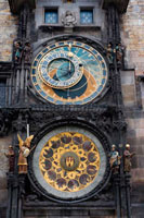 The Astronomical Clock in Prague (Czech Starom? Stský orloj) is a medieval astronomical clock located in Prague, the capital of the Czech Republic, situated in 50 ° 5'13 .23 "N 14 ° 25'15 .30" E. The clock is located in the southern wall of Old Town City Hall in Prague, being a popular tourist attraction. The three main components of the clock are: the astronomical dial, besides indicating that 24 hours a day, representing the positions of the sun and moon in the sky, and other details astronomical animated figures including "Ride of the Apostles ", a clockwork showing, when the clock strikes the hour, the figures of the Twelve Apostles.