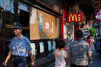 Mc Donnalds around Small shops in the Old City, Shanghai, China. A Mc Donalds signboard in Shanghai, China. The Old City of Shanghai, Shàngh?i L?o Chéngxi?ng, also formerly known as the Chinese city, is the traditional urban core of Shanghai, China. Its boundary was formerly defined by a defensive wall. The Old City was the county seat for the old county of Shanghai. With the advent of foreign concessions in Shanghai, the Old City became just one part of Shanghai's urban core but continued for decades to be the seat of the Chinese authority in Shanghai.