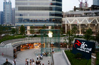 Apple computer store in Lujiazui financial district, in Pudong, in Shanghai, China. View of large modern Apple store in Shanghai China. Apple Store Pudong in front of Shanghai IFC South and North Tower (HSBC building) in Pudong District, Shanghai, China. Shanghai International Finance Centre, usually abbreviated as Shanghai IFC, is a commercial building complex and a shopping centre (branded Shanghai IFC mall) in Shanghai. It incorporates two tower blocks at 249.9 metres (south tower) and 259.9 metres (north tower) housing offices and a hotel, and an 85-metre tall multi-storey building behind and between the two towers.  Shanghai IFC is located in Lujiazui, in Pudong, Shanghai. It occupies a prominent position southeast of the Lujiazui 