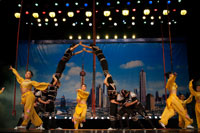 Shanghai Centre. Shanghai Zaji Tuan. Acrobat performance Shanghai Centre Shanghai China. Performance, Human pyramid Audience Stage Inside of a Shanghai troupe of magic and acrobatics, (Shanghai Shangcheng). Centre Theatre. Shanghai Acrobatic Troupe. Shanghai Acrobatic Troupe is the oldest acrobatic troupe in Shanghai and well known around the world. After animal acts were banned at the Shanghai Circus World, the troupe moved to the luxurious Shanghai Centre Theatre in 2005.  This experienced group has skillfully managed to bring together a show that has it all. While maintaining a traditional flavor, the performance is modern with extreme feats to keep you at the edge of your seat. The story is captivating and even the audience can take part!  The show and theater