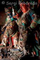 Sculptures by some deities inside the monastery Pelkhor Chode. Gyantse. The monastery is beautiful with its stupa of 9 floors and 108 chapels, but what we liked, is the village life, with its traditional houses and cattle tied in front of each door, as if the watchdog.