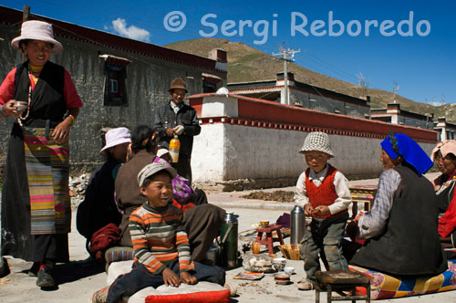 A family celebrates the graduation of a relative in the village of Bainans, located next to the road from Shigatse to Gyantse.
