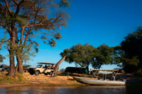 From Victoria Falls is possible to visit the nearby Botswana. Specifically Chobe National Park.   The Chobe National Park in Botswana is only a 1¾-hour drive from Livingstone. It is one of the greatest game reserves in southern Africa and famous for the number of elephant that live there. The Chobe River flows lazily through the Caprivi flood plains and provides a haven for huge herds of buffalo and elephant, zebra, wildebeest and impala which are followed closely by predators including lion, hyena, the elusive leopard and the odd pack of the now rare wild dog. The bird life in particular is exceptional. Travelling to Chobe includes an exciting crossing by boat of the Zambezi River at the point where the 4 countries of Zambia, Zimbabwe, Botswana and Namibia meet. The Safari starts with a morning gameviewing cruise on the Chobe River with tea, coffee, drinks and snacks being served on board. Large flocks of birds, big pods of hippos and very large crocodiles are all around. After disembarking, lunch is then taken at the Chobe Marina Lodge which overlooks the Chobe River and the plains beyond. In the afternoon, open safari vehicles are used for a game drive into the park. Ad a very early morning game drive to all overnight trips on the morning of day two and three depending on your trip. 