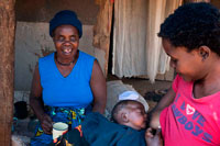 A woman breastfeeding her son in Mukuni Village. Zambia. Zambia launches campaign to promote exclusive breastfeeding. At the launch of the Government of Zambia’s new advocacy campaign for infant and young child feeding, the country’s Minister of Health had a clear message for every mother: Exclusively breastfeed your newborn for the child’s first six months of life. “Exclusive breastfeeding means giving the baby only breast milk for the first six months, and no other liquids or solids, not even water unless medically indicated,” said Minister of Health Kapembwa Simbao. “It is therefore crucial that breastfeeding our children becomes the norm in Zambia, because breast milk plays a very important role in securing the health of children and is essential for overall child survival.” 