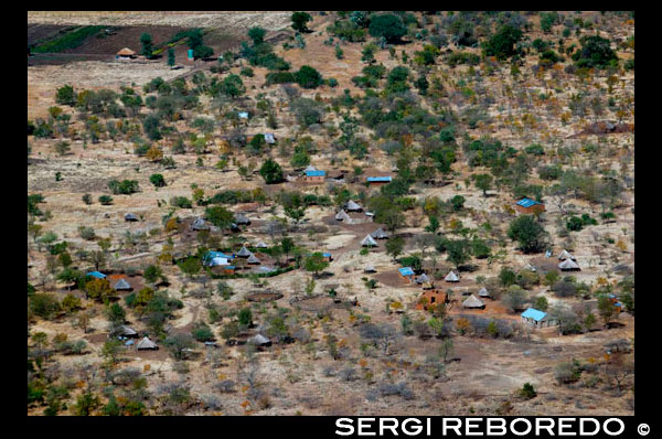 Aerial views of Mukuni village. Zambia. Mukuni, 9.6 km (6.0 mi) to the south-east of present day Livingstone, was the largest village in the area before Livingstone was founded. Its Baleya inhabitants, originally from the Rozwi culture in Zimbabwe, were conquered by Chief Mukuni who came from the Congo in the 18th century. Another group of Baleya under Chief Sekute lived near the river west of the town. The most numerous people in the area, though, were the Batoka under Chief Musokotwane based at Senkobo, 30 km (19 mi) north. These are southern Tonga people but are culturally and linguistically similar to the Baleya and grouped with them as the 'Tokaleya'. The Tokaleya paid tribute to the Lozi of Barotseland but in 1838 the Kololo, a Sotho tribe from South Africa displaced by Zulu wars, migrated north and conquered the Lozi. The Kololo placed chiefs of their subordinate Subiya people of Sesheke over the Tokaleya. In 1855 Scottish missionary traveller David Livingstone became the first European to be shown the Zambezi in the Livingstone vicinity and to see Victoria Falls when he was taken there by the Subiya/Kololo Chief Sekeletu. In 1864 the Lozi threw off their Kololo masters and re-established their dominance over the Subiya and the Tokaleya in the vicinity of the Falls, which became the south-eastern margin of the greater Barotseland kingdom.