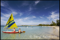 Couple in a small boat to sail - Fernandez Bay Beach - Cat Island.