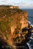 Tourists along the cliffs near the temple Pura Ulu WATU Luhur. Bali. Indonesia.