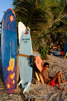 Rent a surfboard on the beach of Kuta. Bali.