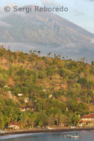 The small fishing village of Amed background with views of Mount Gunung Agung (3142m). East of Bali.