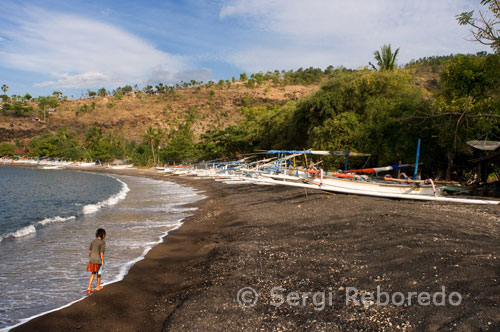 Amed is located in East of Bali, just 30minutes from Amlapura. The beach is covered by black sand and rocks. Not attractive but it is famous snorkling and diving spot for the huge drop of wall. The tourist area is not in the village of Amed. and most of the hotels and diving centers on the road 2km from Amed Village called Jemeluk Beach. There is nothing but the foreign tourist facilities which makes this place very expensive for food and accommodation. Amed Beach is everything you dreamed it would be a rare and special paradise of outstanding exotic beauty, vibrant culture and friendly people. Here you can finally find peace and quiet, enjoy great food and take advantage of comfortable and inexpensive accommodation. From the beach, Amed offers an excellent site for training dives. It has a flat bottom lagoon for instruction and a coral reef only 5 minutes swim away. 