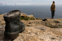 A boot-shaped sculpture pays homage to the pilgrims at the Lighthouse Fisterra.