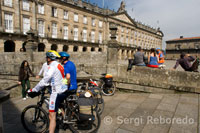 Cyclists in the square do Obradoiro. Santiago de Compostela. 