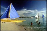 Sailing boat for practice. White beach. Boracay. 